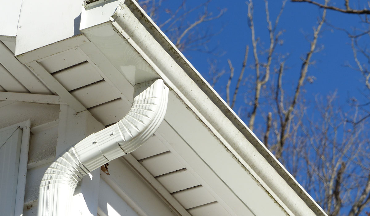 white gutter and downspout