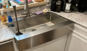 Kitchen Sink Backups inspected inside a residential kitchen before professional drain cleaning restores reliable water flow efficiently.